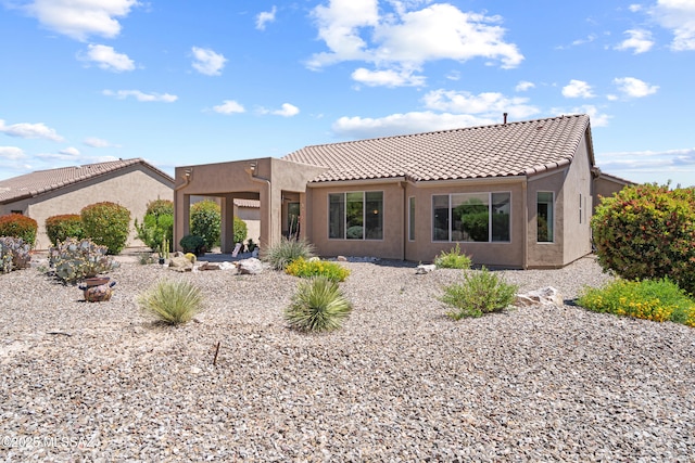 59962 E Arroyo Grande Dr, Oracle, AZ 85623 - rear view of property featuring a tile roof and stucco siding
