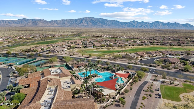 59962 E Arroyo Grande Dr, Oracle, AZ 85623 - aerial perspective of suburban area featuring a local golf course, a mountainous background, and a pool