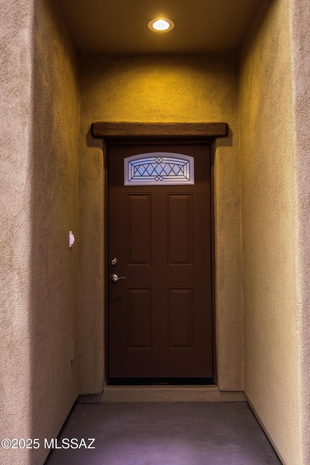 174 Via Casa, Rio Rico, AZ 85648 - view of exterior entry featuring stucco siding