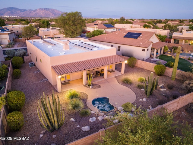 8183 N Sombrero Point Dr, Tucson, AZ 85743 - aerial perspective of suburban area with mountains
