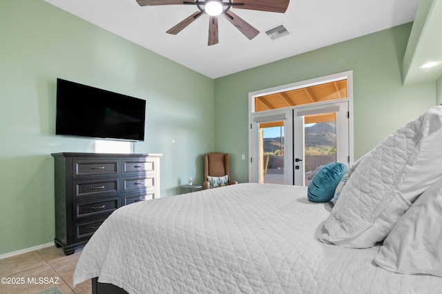 8183 N Sombrero Point Dr, Tucson, AZ 85743 - bedroom with access to outside, light tile patterned floors, french doors, and a ceiling fan