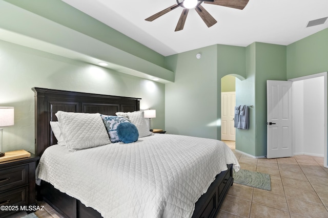8183 N Sombrero Point Dr, Tucson, AZ 85743 - bedroom with light tile patterned floors and a ceiling fan