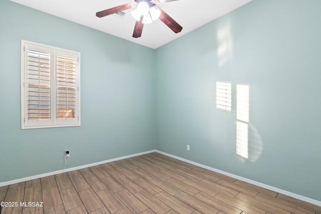 8183 N Sombrero Point Dr, Tucson, AZ 85743 - spare room with wood finished floors and ceiling fan