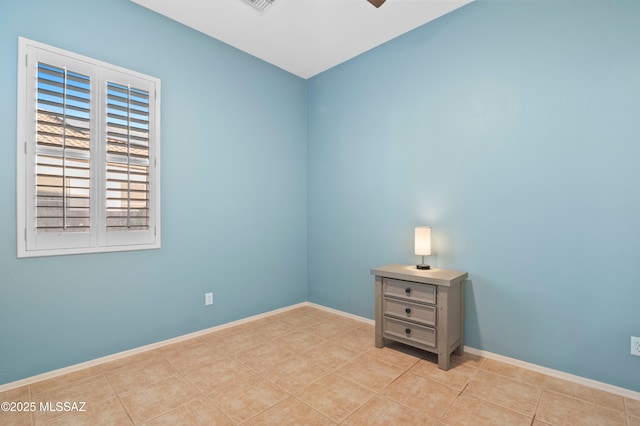 8183 N Sombrero Point Dr, Tucson, AZ 85743 - unfurnished room featuring ceiling fan and tile patterned flooring