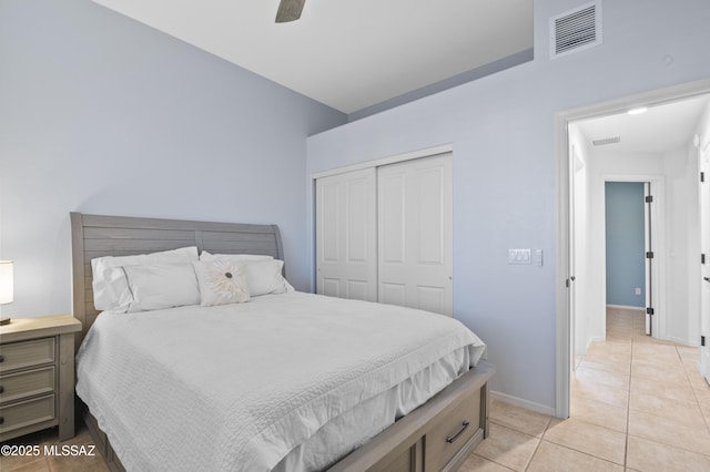 8183 N Sombrero Point Dr, Tucson, AZ 85743 - bedroom featuring light tile patterned flooring, a closet, and a ceiling fan