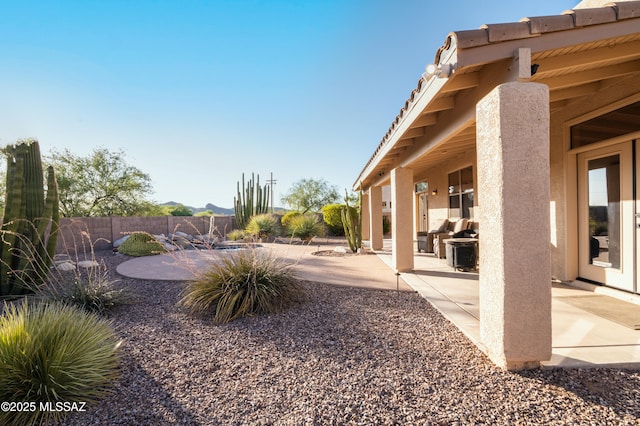 8183 N Sombrero Point Dr, Tucson, AZ 85743 - fenced backyard featuring a patio