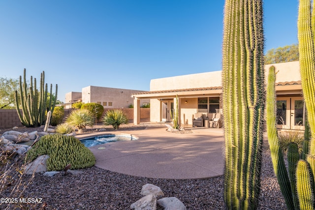 8183 N Sombrero Point Dr, Tucson, AZ 85743 - view of swimming pool with a patio area, french doors, and a fenced backyard