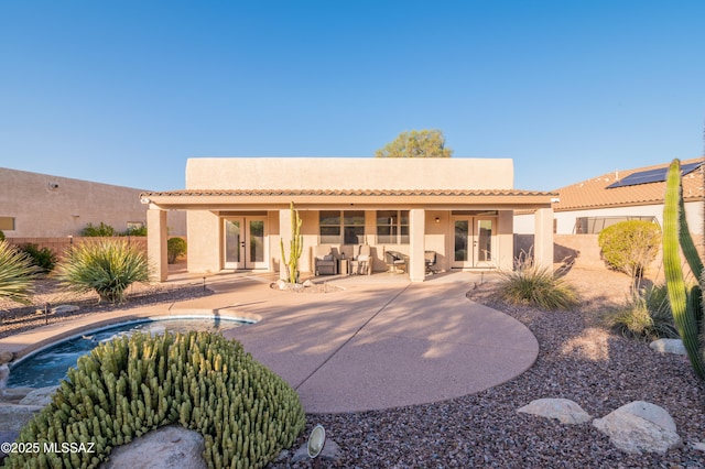 8183 N Sombrero Point Dr, Tucson, AZ 85743 - rear view of house with french doors, a patio area, stucco siding, and a tile roof