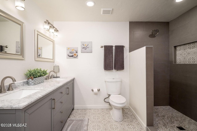 3409 E Linden St, Tucson, AZ 85716 - full bath featuring a walk in shower, toilet, double vanity, baseboards, and tile patterned flooring