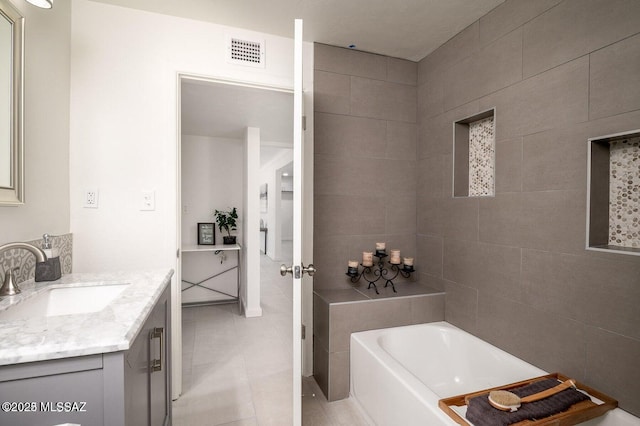 3409 E Linden St, Tucson, AZ 85716 - full bathroom with vanity, a bath, and tile patterned flooring