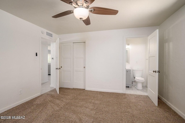 3409 E Linden St, Tucson, AZ 85716 - unfurnished bedroom with carpet flooring, a closet, and baseboards