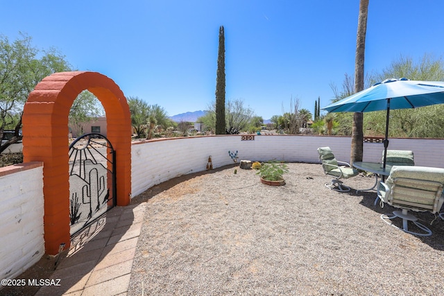 628 Corpino De Pecho, Green Valley, AZ 85614 - view of patio featuring a mountain view