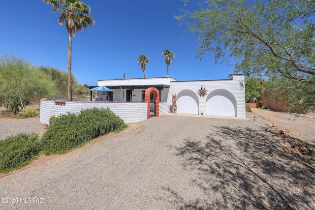 628 Corpino De Pecho, Green Valley, AZ 85614 - view of front of property with driveway, a garage, and a porch