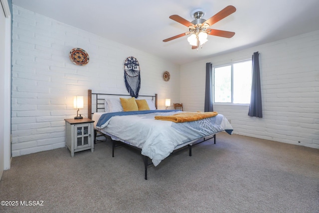 628 Corpino De Pecho, Green Valley, AZ 85614 - carpeted bedroom featuring brick wall and a ceiling fan