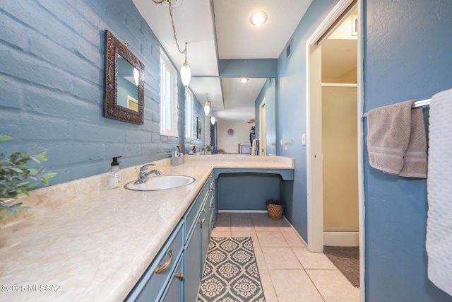628 Corpino De Pecho, Green Valley, AZ 85614 - full bathroom featuring vanity, tile patterned floors, a shower stall, and baseboards