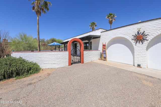 628 Corpino De Pecho, Green Valley, AZ 85614 - view of front of house with asphalt driveway and an attached garage