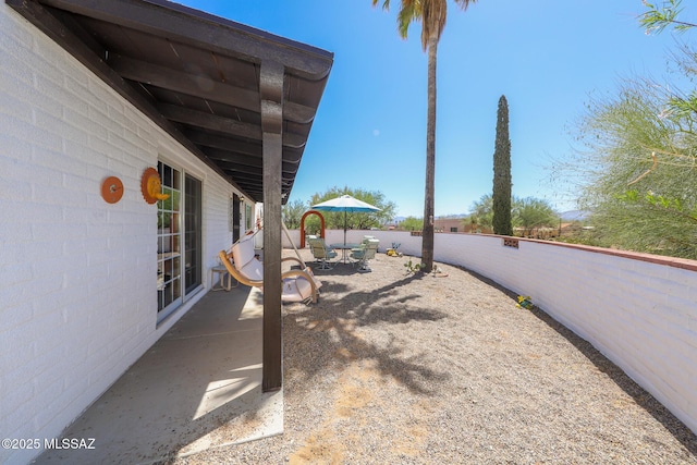 628 Corpino De Pecho, Green Valley, AZ 85614 - fenced backyard with a patio area