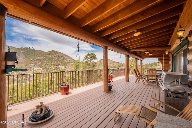 12709 N Casa Grande Ave, Mount Lemmon, AZ 85619 - wooden terrace featuring a mountain view and outdoor dining space