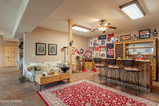 12709 N Casa Grande Ave, Mount Lemmon, AZ 85619 - living area featuring a dry bar and a ceiling fan