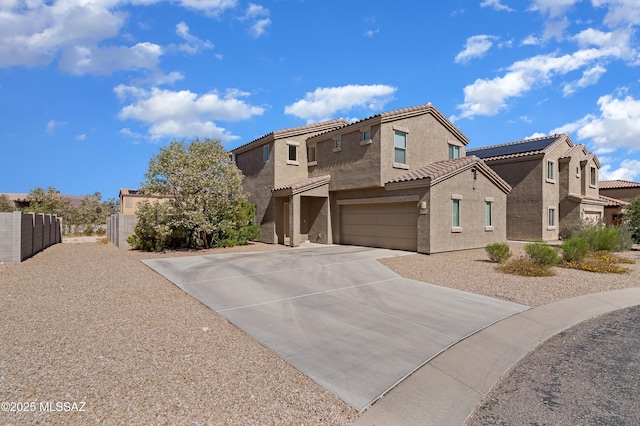 6494 E Brushback Loop, Tucson, AZ 85756 - view of front of property featuring stucco siding, driveway, an attached garage, fence, and a tiled roof