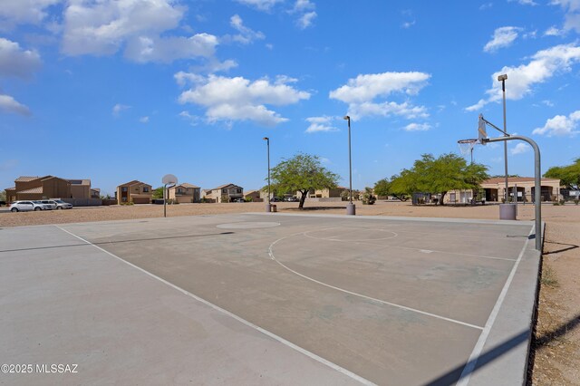 6494 E Brushback Loop, Tucson, AZ 85756 - view of sport court featuring community basketball court and a residential view