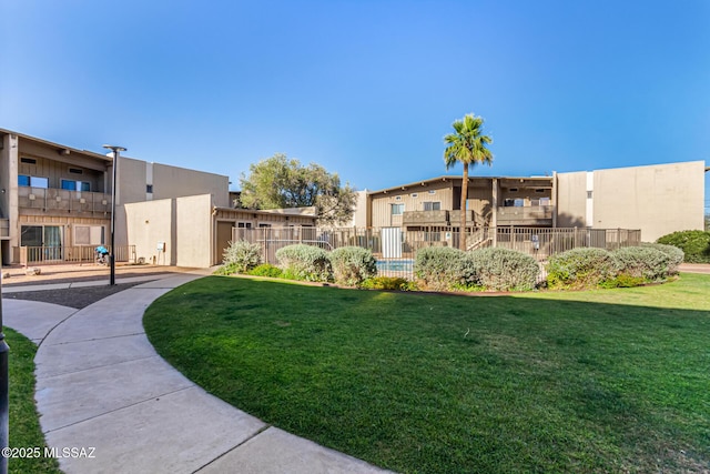 2525 N Alvernon Way Unit F8, Tucson, AZ 85712 - surrounding community with a lawn