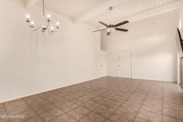 2525 N Alvernon Way Unit F8, Tucson, AZ 85712 - empty room featuring a chandelier, beam ceiling, a ceiling fan, and wood ceiling