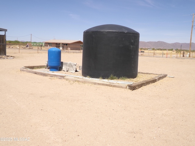 2474 W Victoria Ln, Willcox, AZ 85643 - view of outbuilding featuring an outbuilding, a mountain view, an exterior structure, and fence