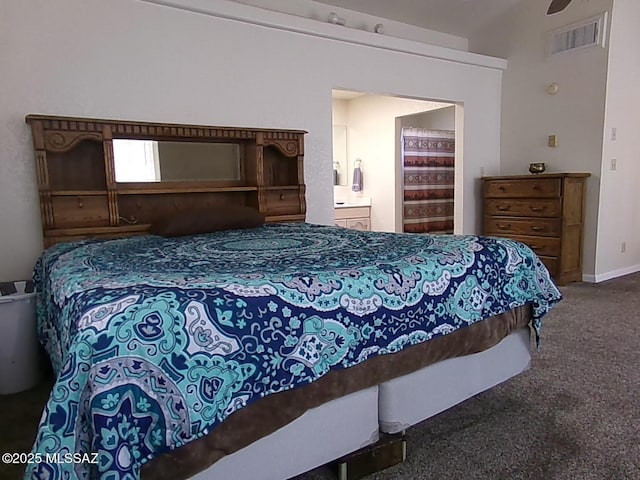 2474 W Victoria Ln, Willcox, AZ 85643 - carpeted bedroom with baseboards and ensuite bathroom