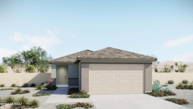 view of front of house with fence, concrete driveway, a garage, and stucco siding