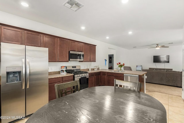 6210 S Open Desert Pl, Tucson, AZ 85706 - kitchen with appliances with stainless steel finishes, a sink, ceiling fan, light tile patterned flooring, and recessed lighting