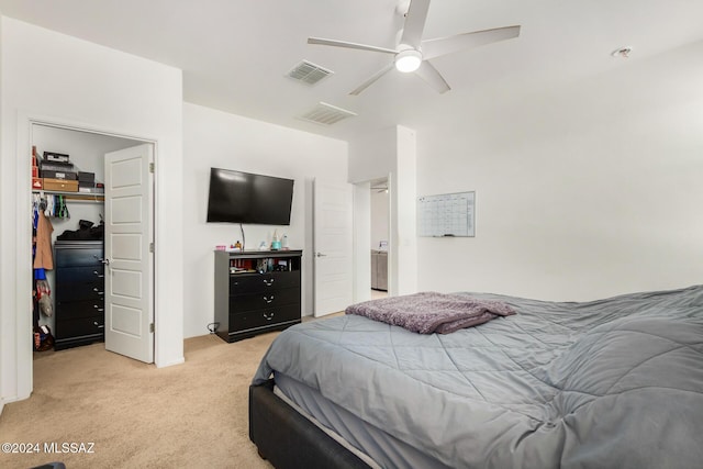 6210 S Open Desert Pl, Tucson, AZ 85706 - bedroom with light carpet, a spacious closet, a closet, and a ceiling fan