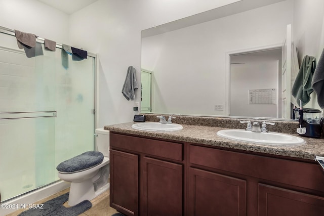 6210 S Open Desert Pl, Tucson, AZ 85706 - full bath featuring a stall shower, toilet, double vanity, and tile patterned flooring