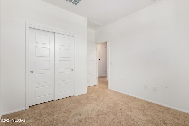 6210 S Open Desert Pl, Tucson, AZ 85706 - unfurnished bedroom with carpet flooring, a closet, and baseboards