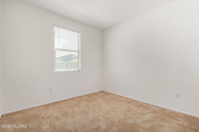6210 S Open Desert Pl, Tucson, AZ 85706 - carpeted empty room with baseboards