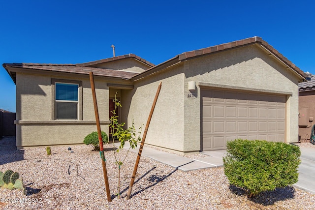 6210 S Open Desert Pl, Tucson, AZ 85706 - ranch-style house featuring a garage, stucco siding, and a tiled roof