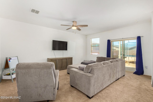 6210 S Open Desert Pl, Tucson, AZ 85706 - living area featuring light carpet and ceiling fan