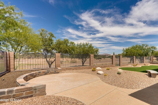 2559 E Wrightson View Dr, Green Valley, AZ 85614 - view of patio with fence and a gate