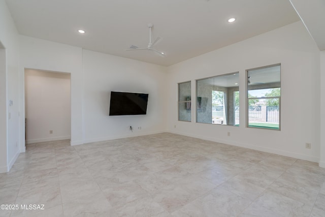 2559 E Wrightson View Dr, Green Valley, AZ 85614 - unfurnished living room with ceiling fan and recessed lighting