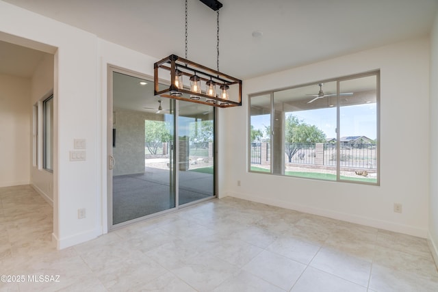 2559 E Wrightson View Dr, Green Valley, AZ 85614 - unfurnished room featuring baseboards and a ceiling fan