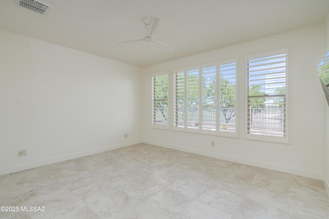 2559 E Wrightson View Dr, Green Valley, AZ 85614 - unfurnished room featuring ceiling fan and baseboards