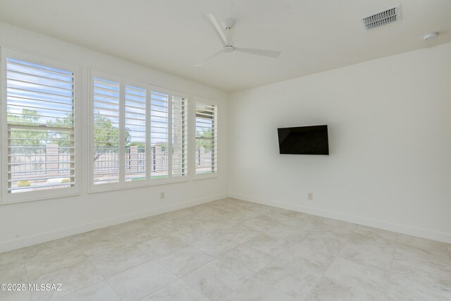 2559 E Wrightson View Dr, Green Valley, AZ 85614 - unfurnished room featuring a ceiling fan, baseboards, and a smoke detector