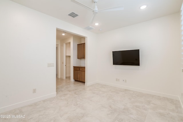 2559 E Wrightson View Dr, Green Valley, AZ 85614 - spare room featuring a ceiling fan, recessed lighting, and baseboards