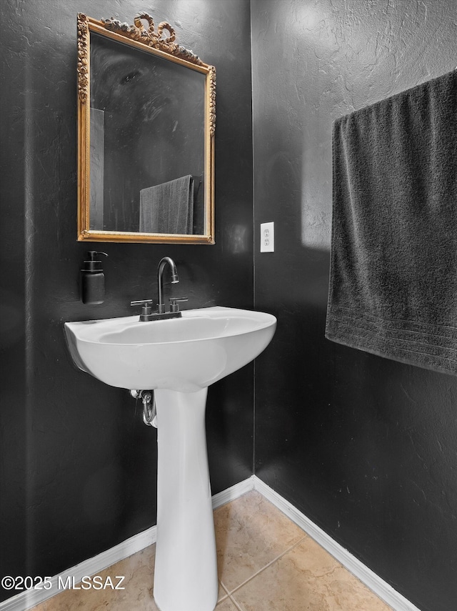 4801 E Canary Grass Dr, Tucson, AZ 85756 - bathroom featuring tile patterned flooring and baseboards