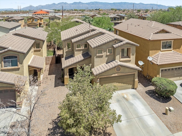 4801 E Canary Grass Dr, Tucson, AZ 85756 - aerial perspective of suburban area featuring a mountain backdrop