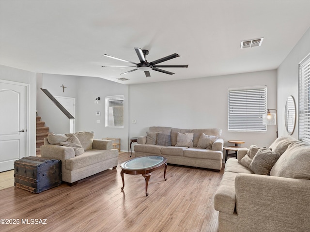 4801 E Canary Grass Dr, Tucson, AZ 85756 - living area with a ceiling fan, stairway, and light wood-style flooring