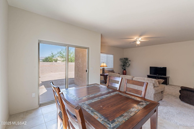 12622 N Wildrose Dr, Marana, AZ 85653 - dining area featuring a ceiling fan, baseboards, and light tile patterned flooring