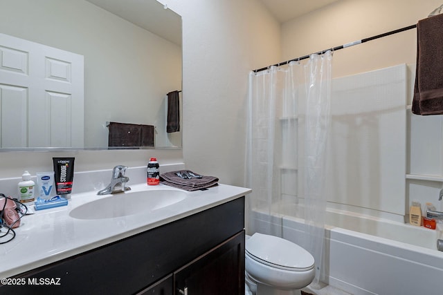 12622 N Wildrose Dr, Marana, AZ 85653 - full bathroom with vanity, toilet, and shower / tub combo with curtain