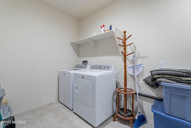 12622 N Wildrose Dr, Marana, AZ 85653 - washroom with washer and clothes dryer and baseboards