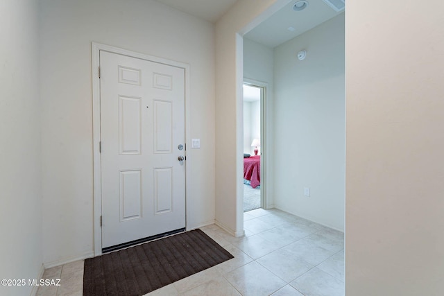 12622 N Wildrose Dr, Marana, AZ 85653 - foyer entrance with light tile patterned flooring and baseboards